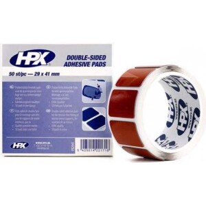 Kaksipuolinen teippipala rullassa